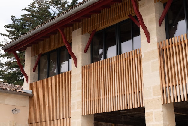 Balcony wood fence facade restoration of old wooden house