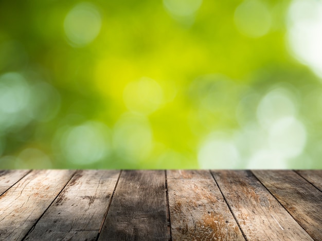 Balcony or wooden terrace with greenery background