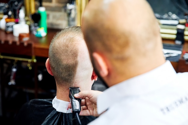 Bald man at the barbershop