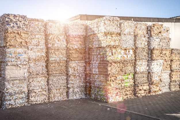 Bales of cardboard and box board with strapping wire ties recycling