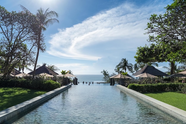 Balinese landscape of pool and blue sky comfortable resort Bali IndonesiaxA