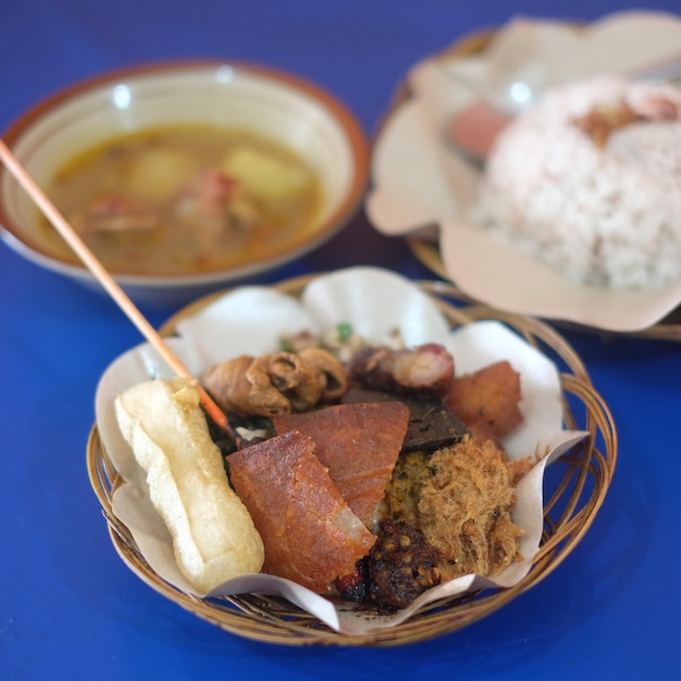 Balinese typical food nasi babi guling specialty consisting of pork meat pork belly pork skin