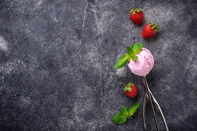 Ball of strawberry Ice cream in scoop