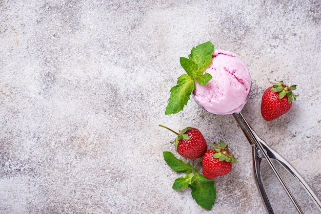 Ball of strawberry Ice cream in scoop