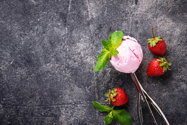 Ball of strawberry Ice cream in scoop