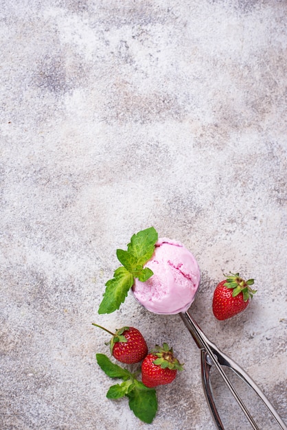 Ball of strawberry Ice cream in scoop