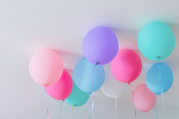 Balloons on white wooden