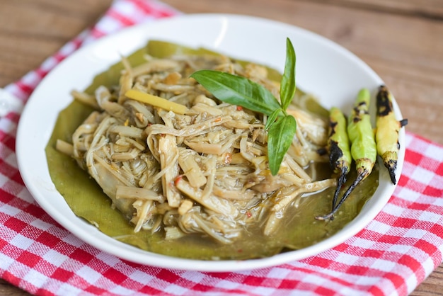 Bamboo shoots for food Sliced and cooking bamboo shoots on banana leaf on the table food in Thailand