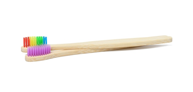 Bamboo toothbrushes on a white isolated background