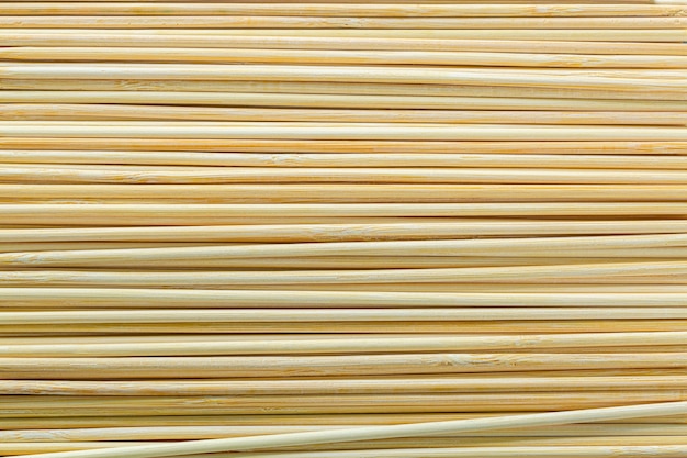 Bamboo toothpicks on white backgroundmacro bamboo