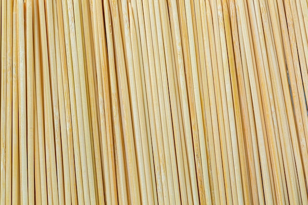 Bamboo toothpicks on white backgroundmacro bamboo