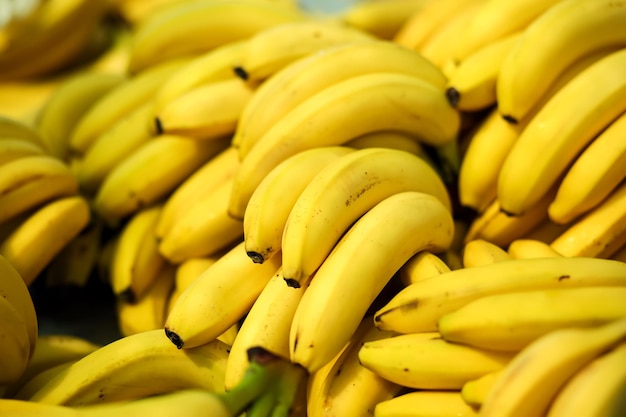 Banana background on a shelf in market Organic eating Farmer's food Close up