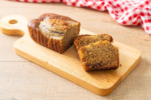 banana cake sliced on wood board