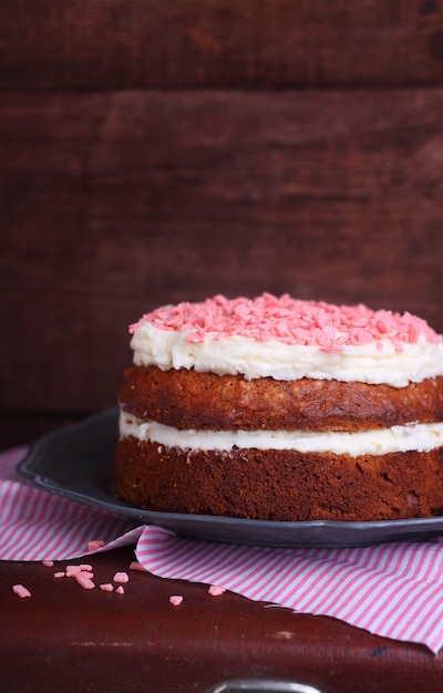 Banana cake with cream in a white dish