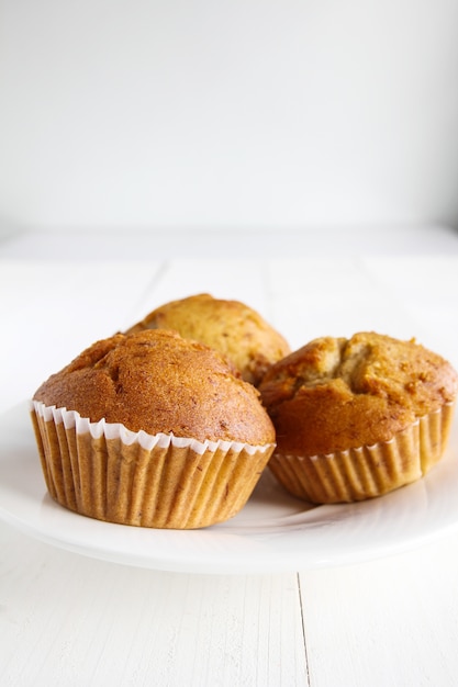 Banana cakes on wooden table.