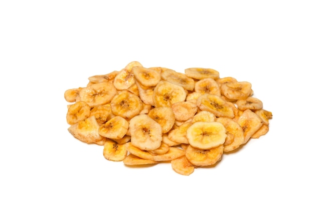 Banana chips isolated on a white background. Dehydrated banana slices.