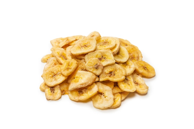 Banana chips isolated on a white background. Dehydrated banana slices.