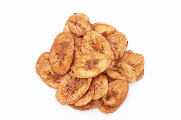 Banana chips on white background