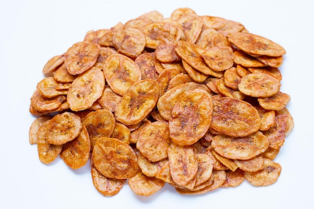 Banana chips on white background