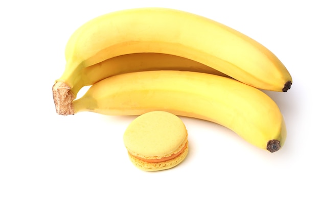 Banana and macaroon isolated on white background