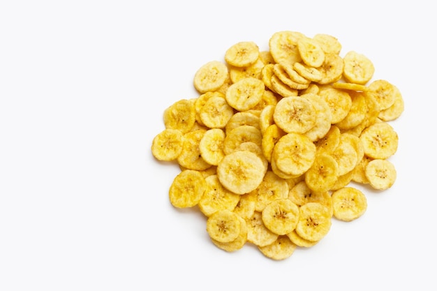 Banana slice chips on white background