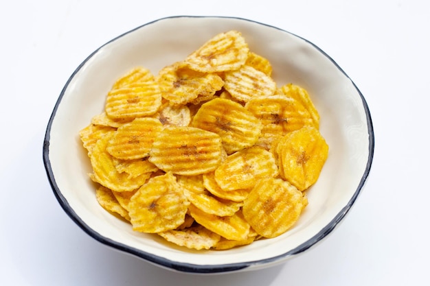 Banana slice chips on white background