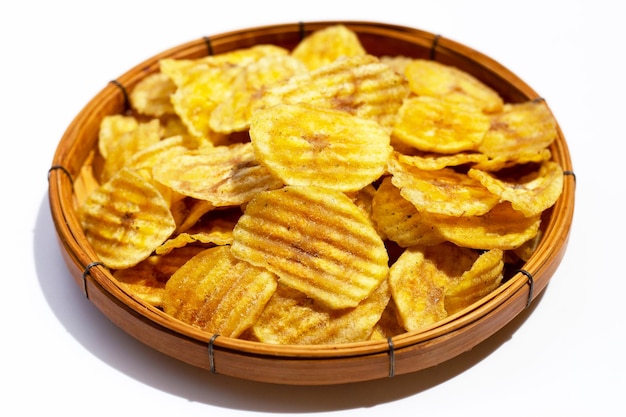 Banana slice chips on white background