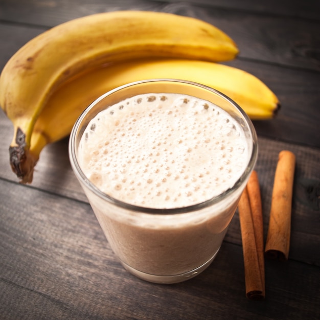 Banana smoothie and cinnamon sticks