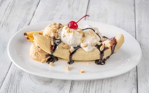 Banana split - American ice-cream based dessert on the serving plate