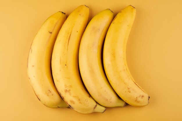 Bananas yellow background with copy space