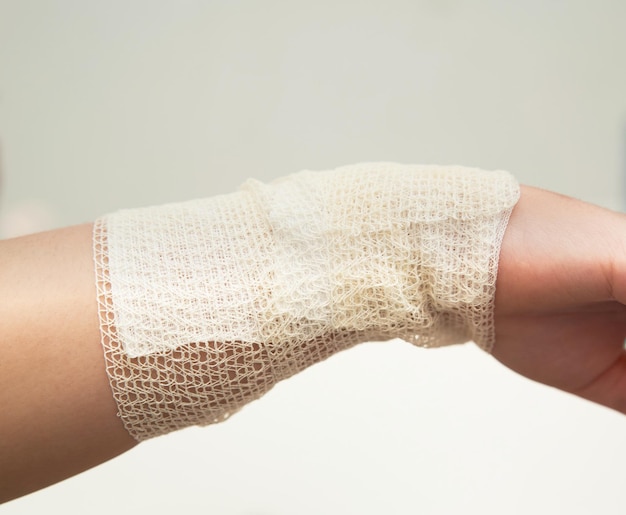 Bandage on arm with gauze for burn wound