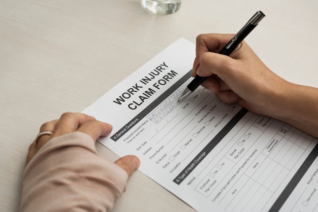 Bandaged woman filling out a form