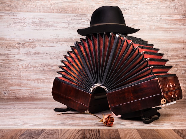 Bandoneon, tango instrument, and a hut