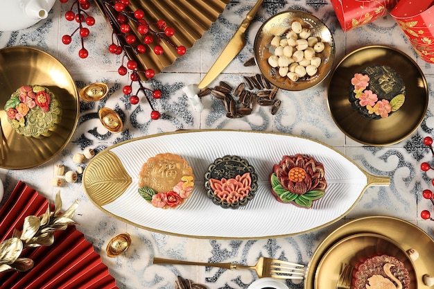 Bandung, Indonesia, 02092021:  Homemade Premium Moon Cake (Mooncake) with Golden Dust Isolated on Black Background. Concept for Mid Autumn Festival with Copy Space for Text