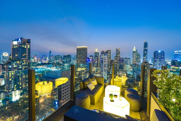 Bangkok city view point from rooftop bar, cityscape blue sky and city light, Thailand