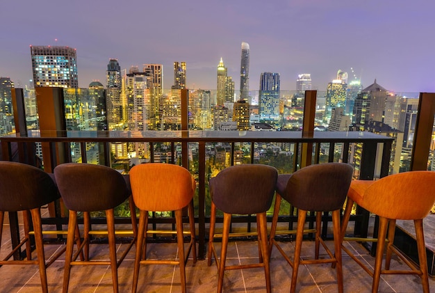 Bangkok city view point from rooftop bar, cityscape blue sky and city light, Thailand