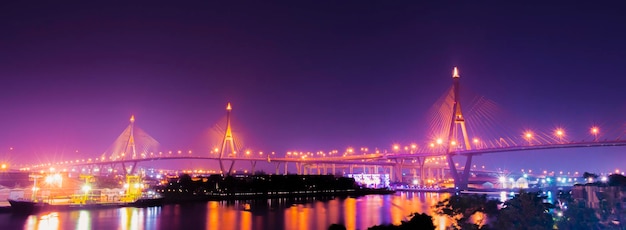 BANGKOK THAILAND April 11 2022 Panoramic night view of Bhumibol Bridge Translation left to right Bhumibol Bridge 1 and Bhumibol Bridge 2 Bangkok Thailand