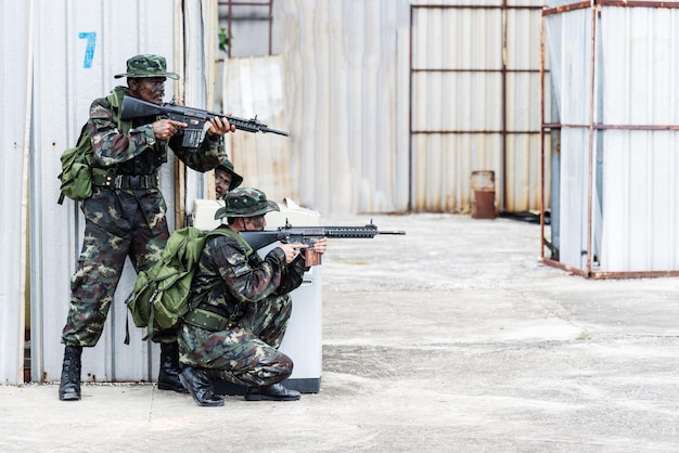 Bangkok Thailand April 21 2018 Simulation of the battle plan Two military used machine guns to fight the enemy Photo rally by NikonClub Thailand at 11Th Infantry Regiment