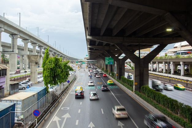 BANGKOK, THAILAND - JULY 02, 2019: Traffic motion during rush hour on Vibhavadi-Rangsit Road in Bangkok Thailand.