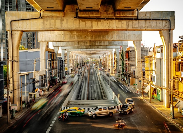 Bangkok traffic under the highway bridge in Thailand