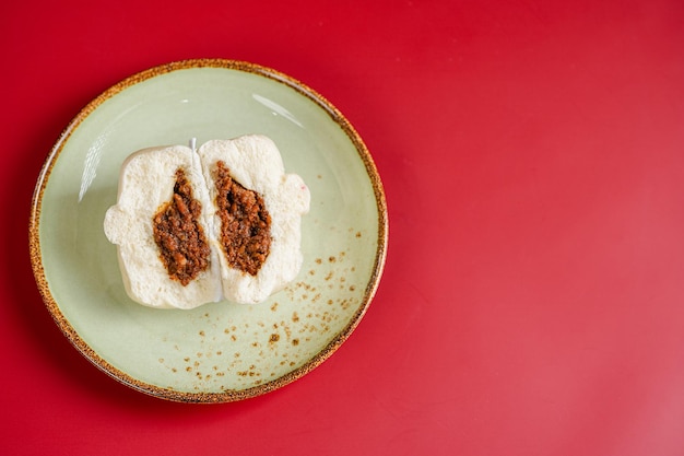 Baozi or Bakpao is a type of yeastleavened filled bun in various Chinese cuisines