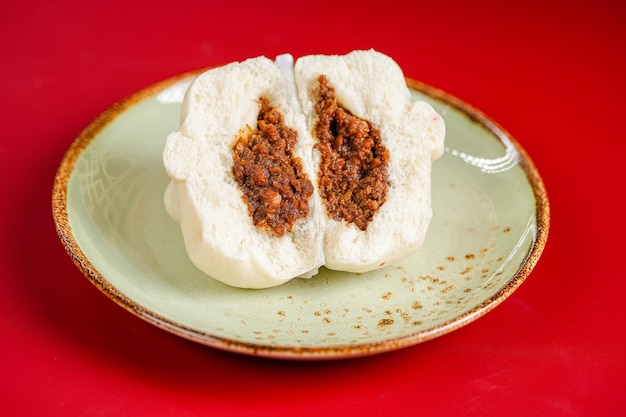 Baozi or Bakpao is a type of yeastleavened filled bun in various Chinese cuisines