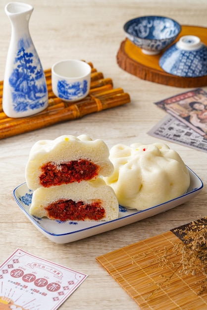 Baozi or bao, is a type of yeast-leavened filled bun in various Chinese cuisines.