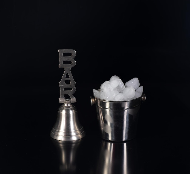 bar accessories for drinks isolated on black background