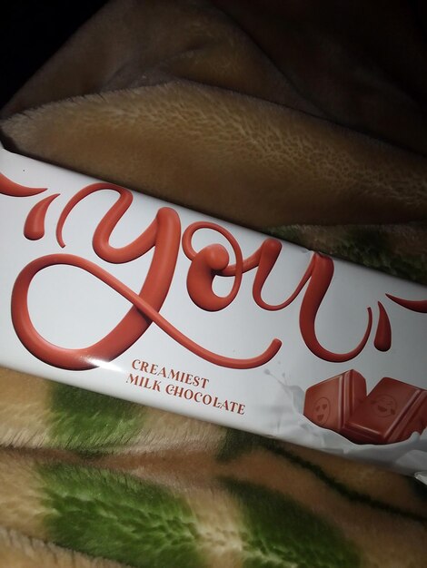 A bar of chocolate bar is labeled with the word " macaron " on the side.