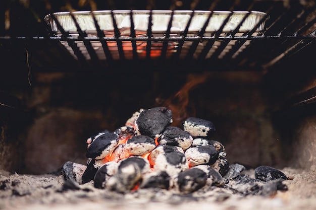 Barbecue charcoal burning on fire