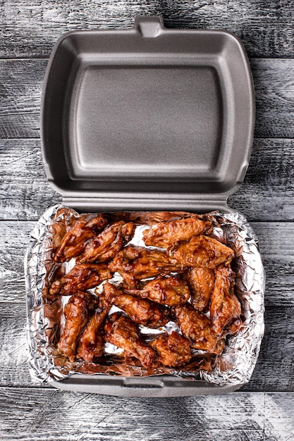 Barbecue chicken wings barbecue wings on a white background for takeaway