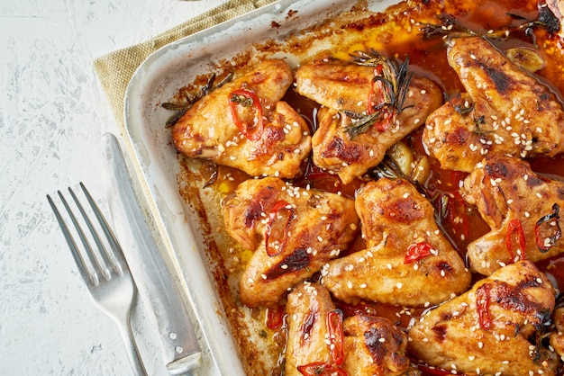 Barbecue chicken wings. Sticky asian spicy wings with teriyaki.