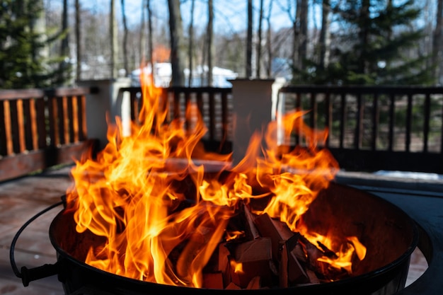 Barbecue grill with fire on open air close up