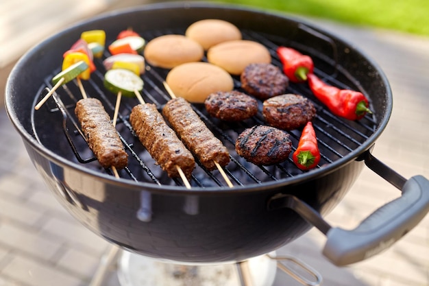 barbecue kebab meat and vegetables on grill